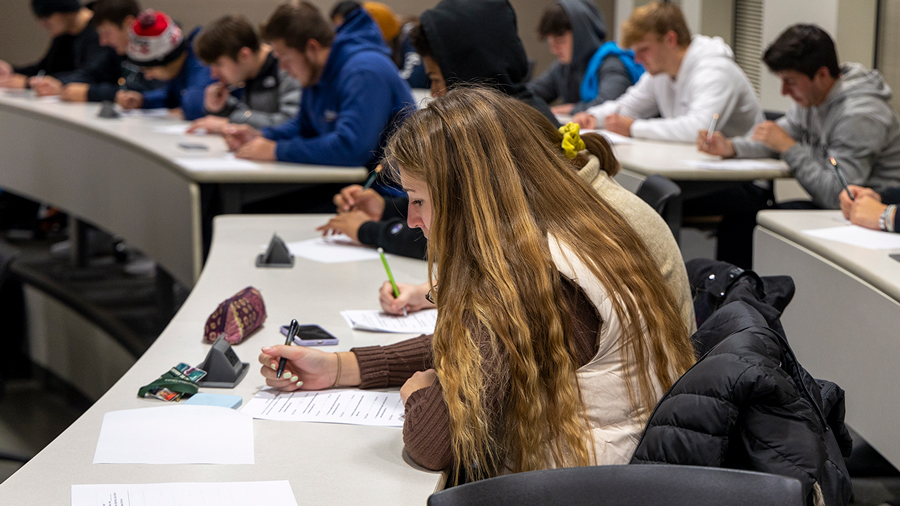 Student taking survey in classroom