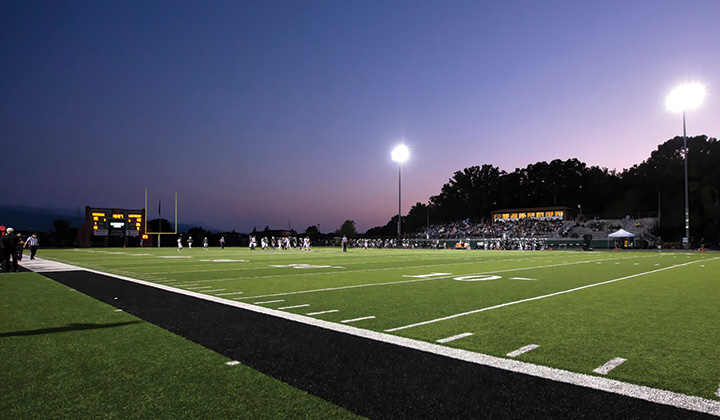 Football game at dusk in Raabe Stadium