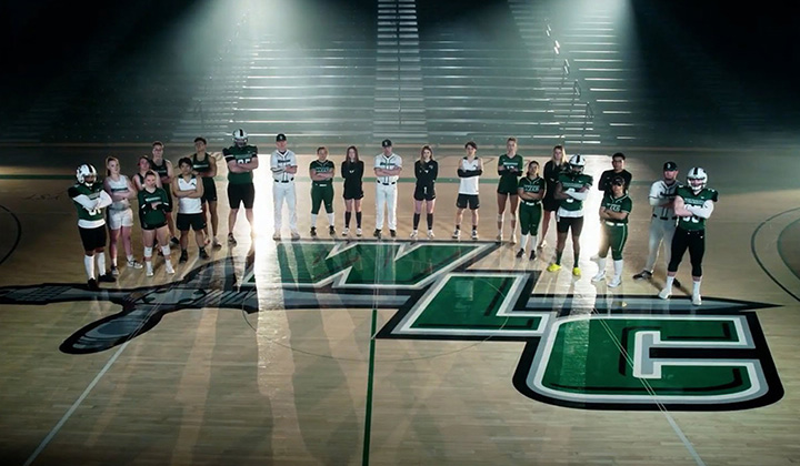 Warriors student-athletes posing in the Time of Grace Center