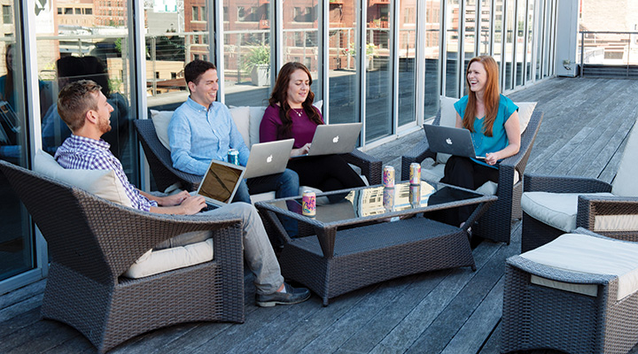 Business graduates working together at Milwaukee agency