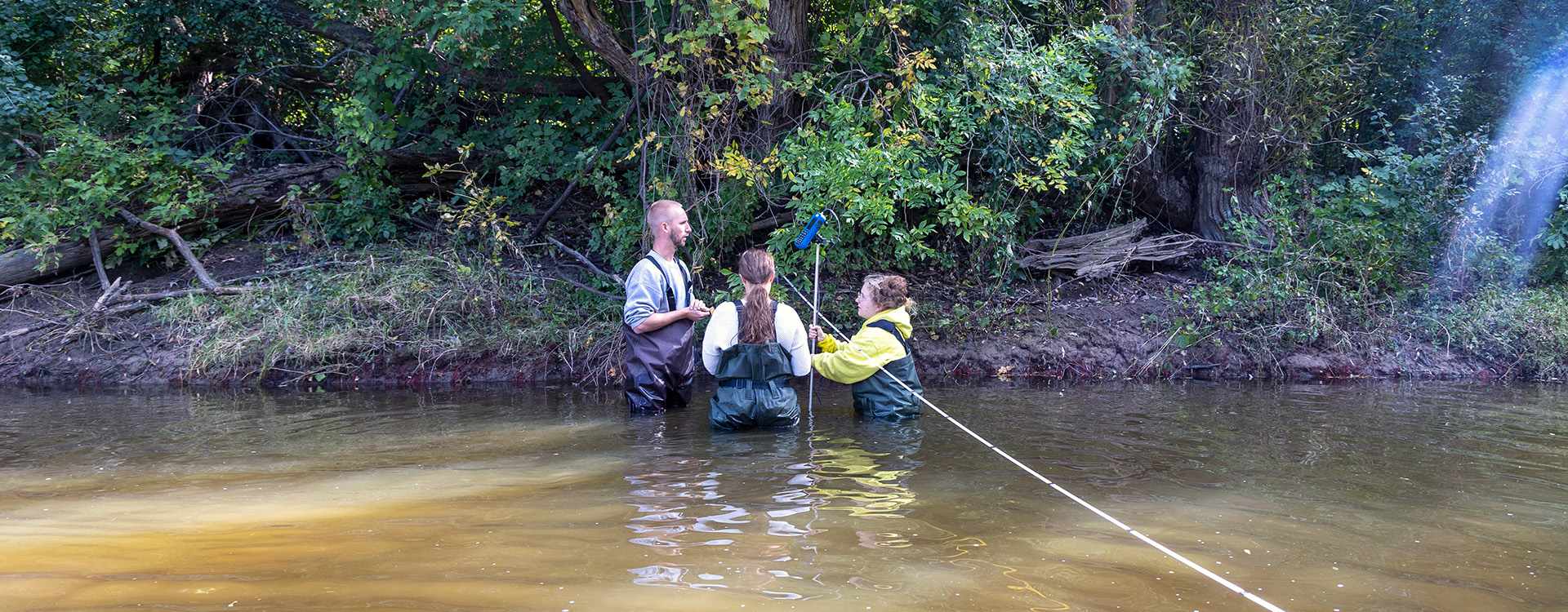 WLC students exploring a local waterway