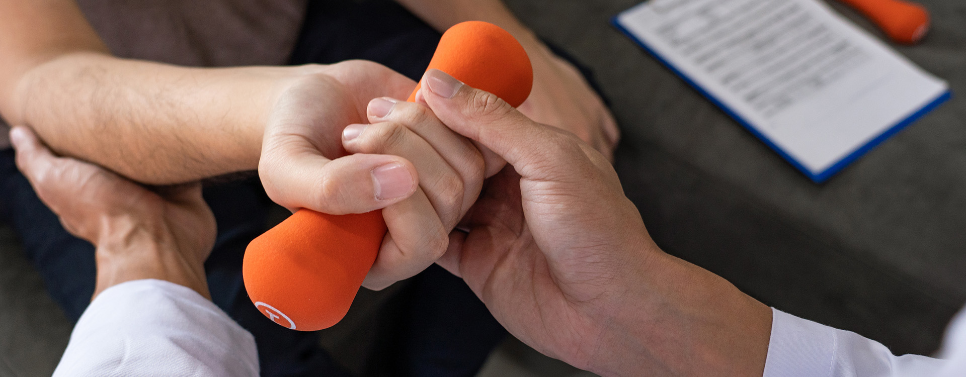 Physical therapist working with patient