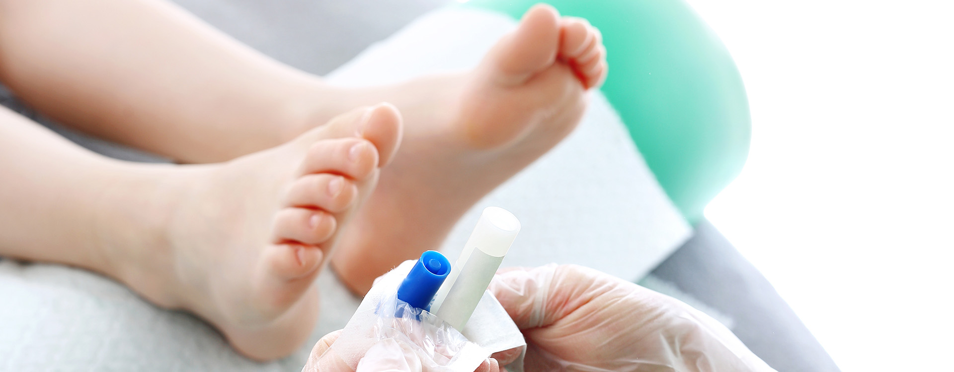 Podiatrist examining child's feet