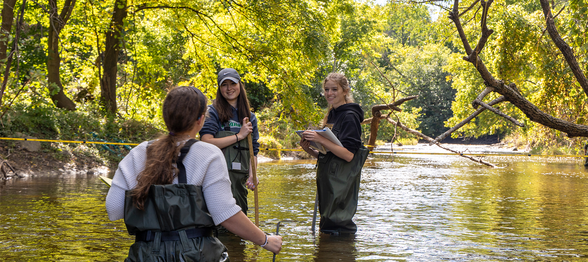 Marine biology students in river