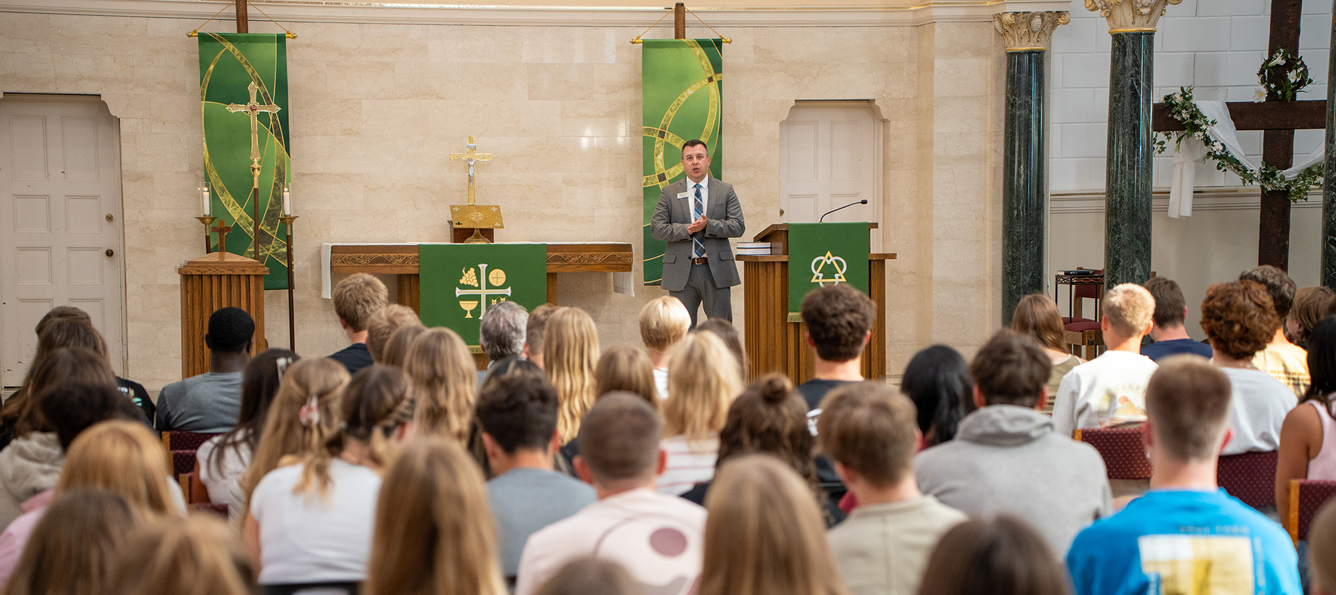 Pastor leading chapel service