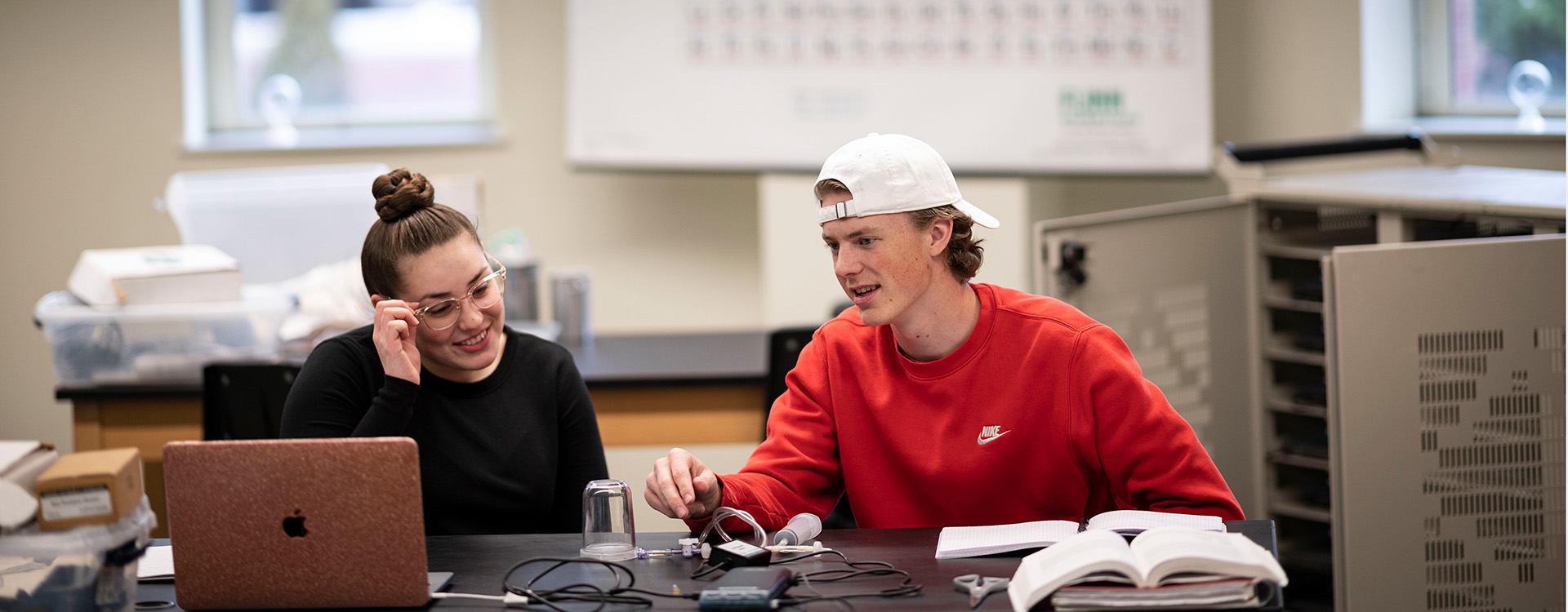 WLC students using equipment in physics lab