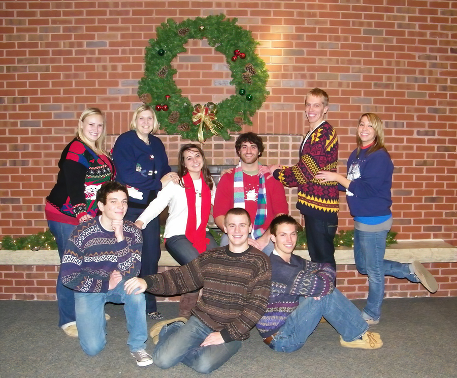 Students by fireplace in Warrior Underground during Christmas