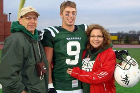 Football player with family