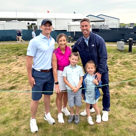 People at golf course in posed image