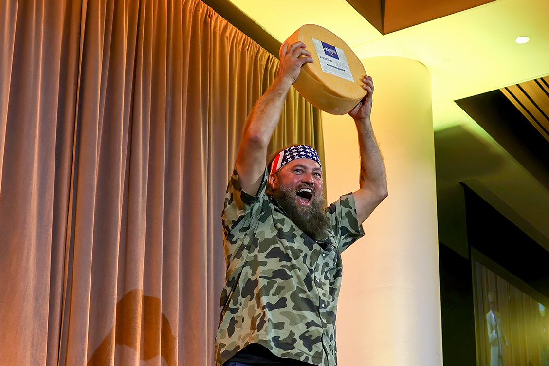 Willie with wheel of cheese