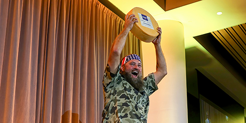 Willie with wheel of cheese