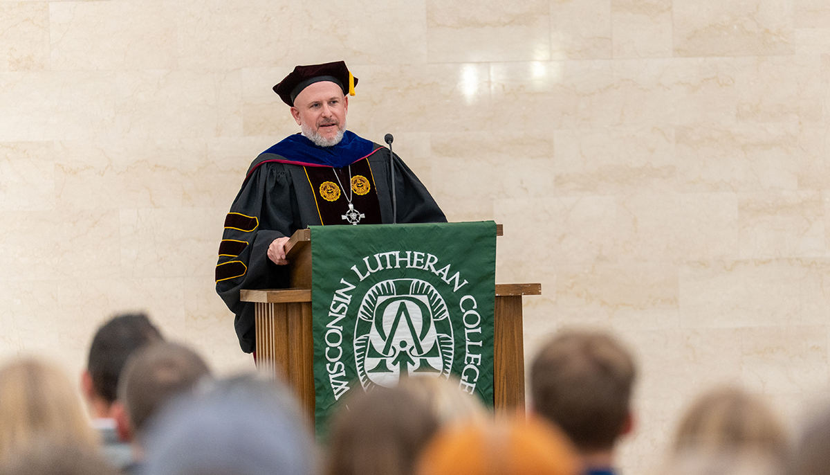 Honors keynote speaker at podium